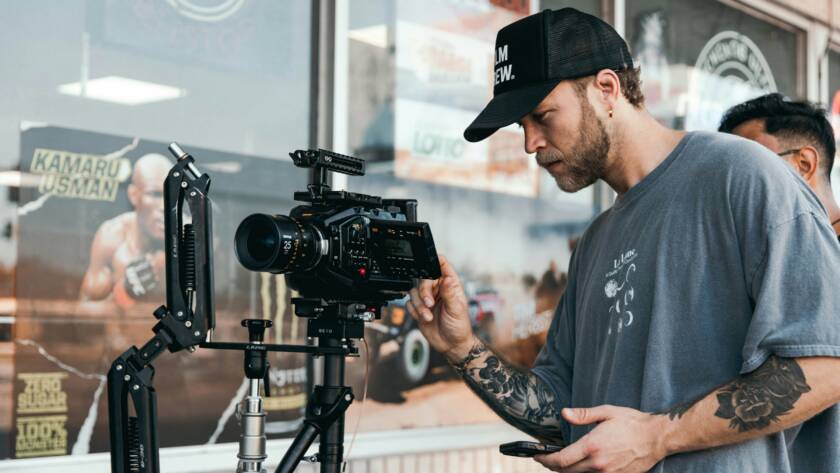 A guy shooting a b-roll footage for his video content.