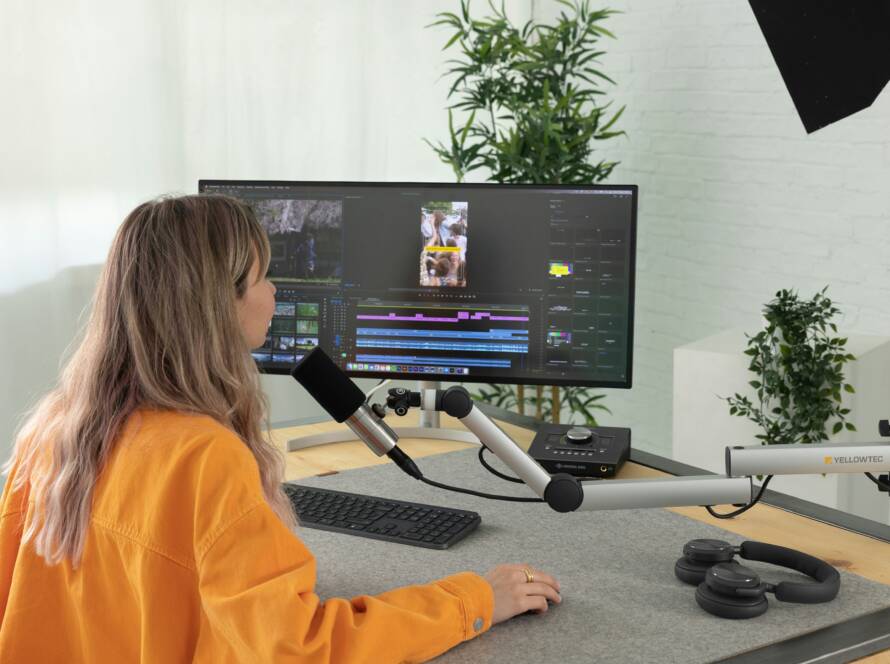 A girl doing video editing on her computer.