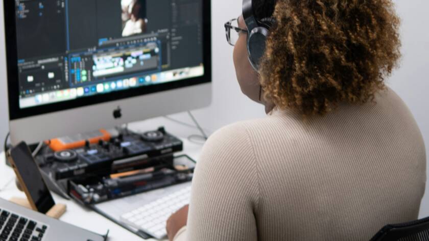 A girl doing video editing.