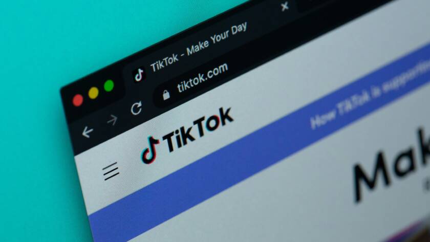 TikTok app on a laptop screen.